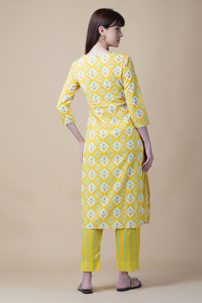 Yellow Block Printed Suit Set with Pintucked Yoke